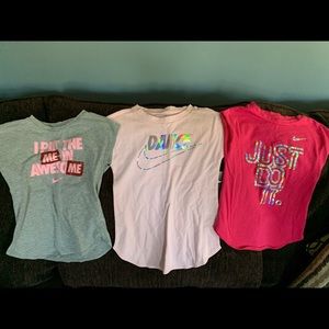 3 girls Nike shirts